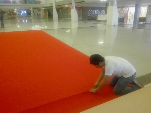 Red carpet installation in malls