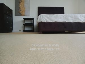 Beige carpeting bedroom