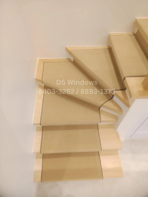 wooden stairs carpet